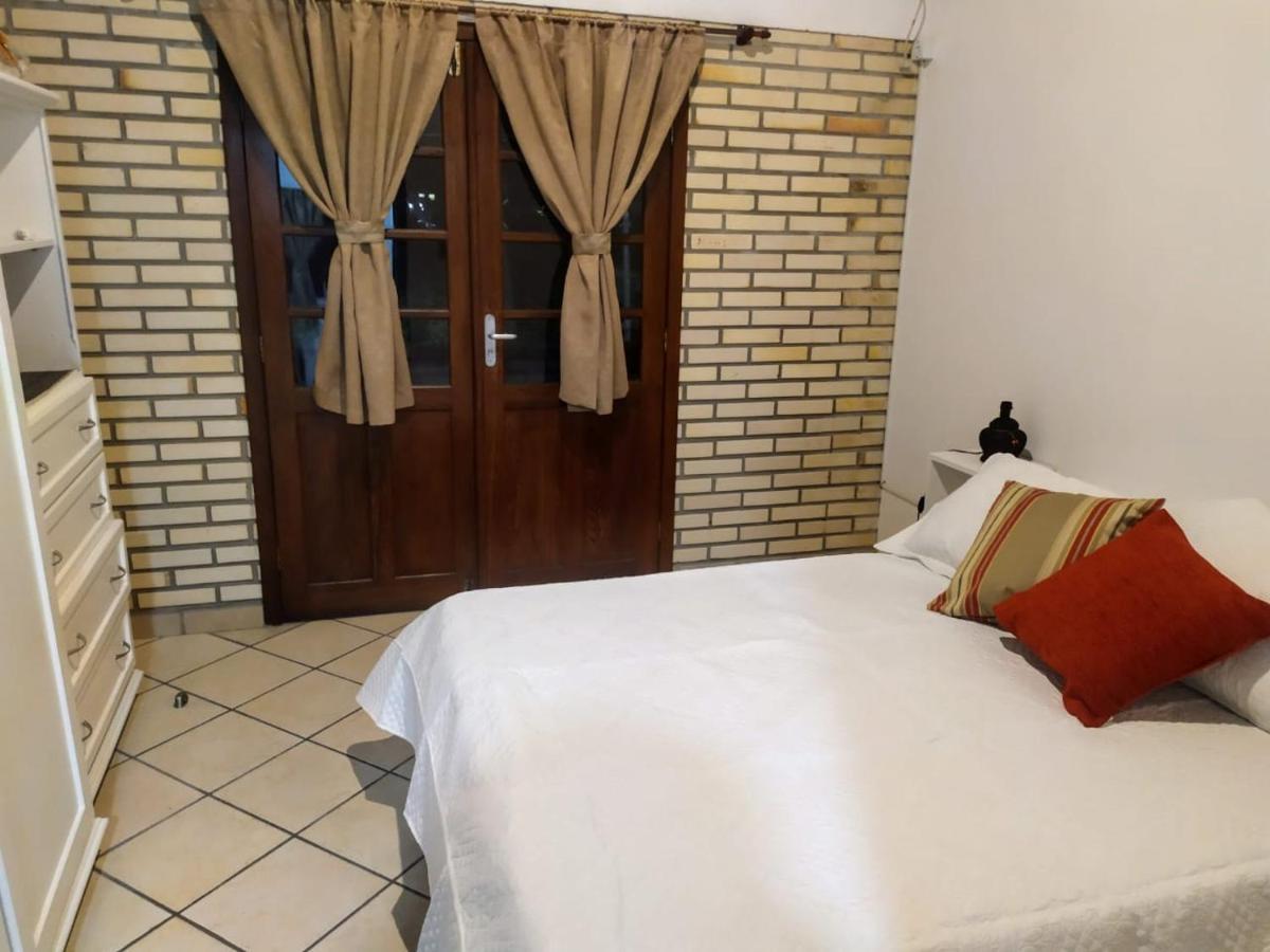 Отель Residencial Costumes Brasileiras Бомбиньяс Экстерьер фото