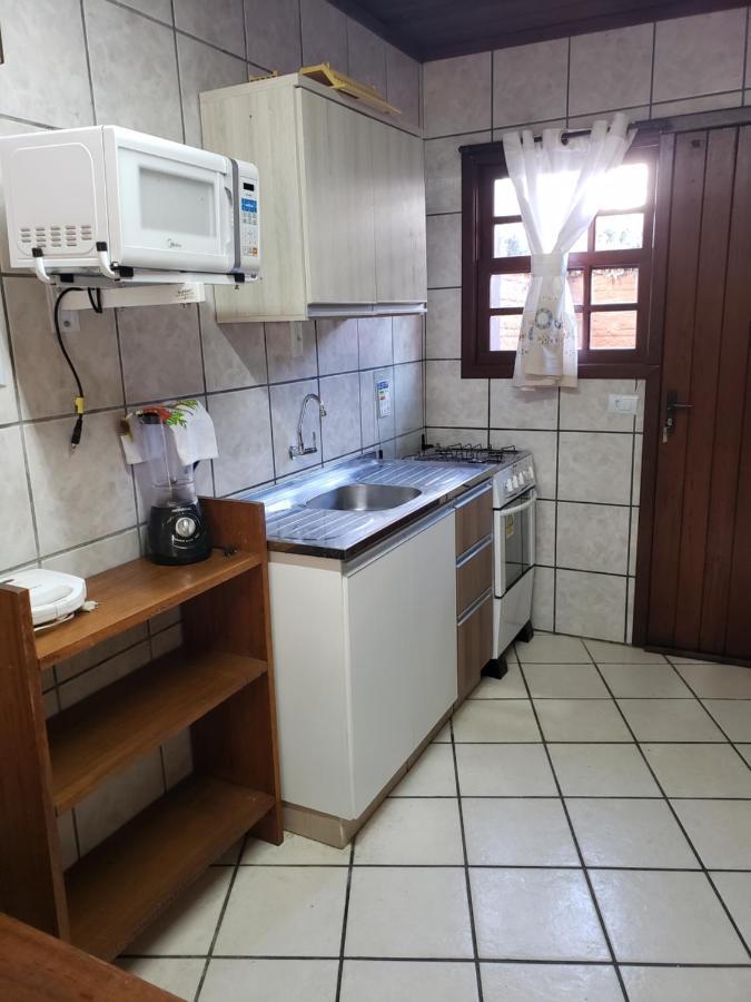 Отель Residencial Costumes Brasileiras Бомбиньяс Экстерьер фото