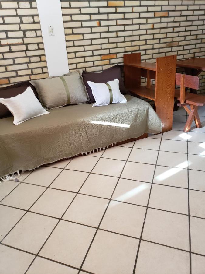 Отель Residencial Costumes Brasileiras Бомбиньяс Экстерьер фото